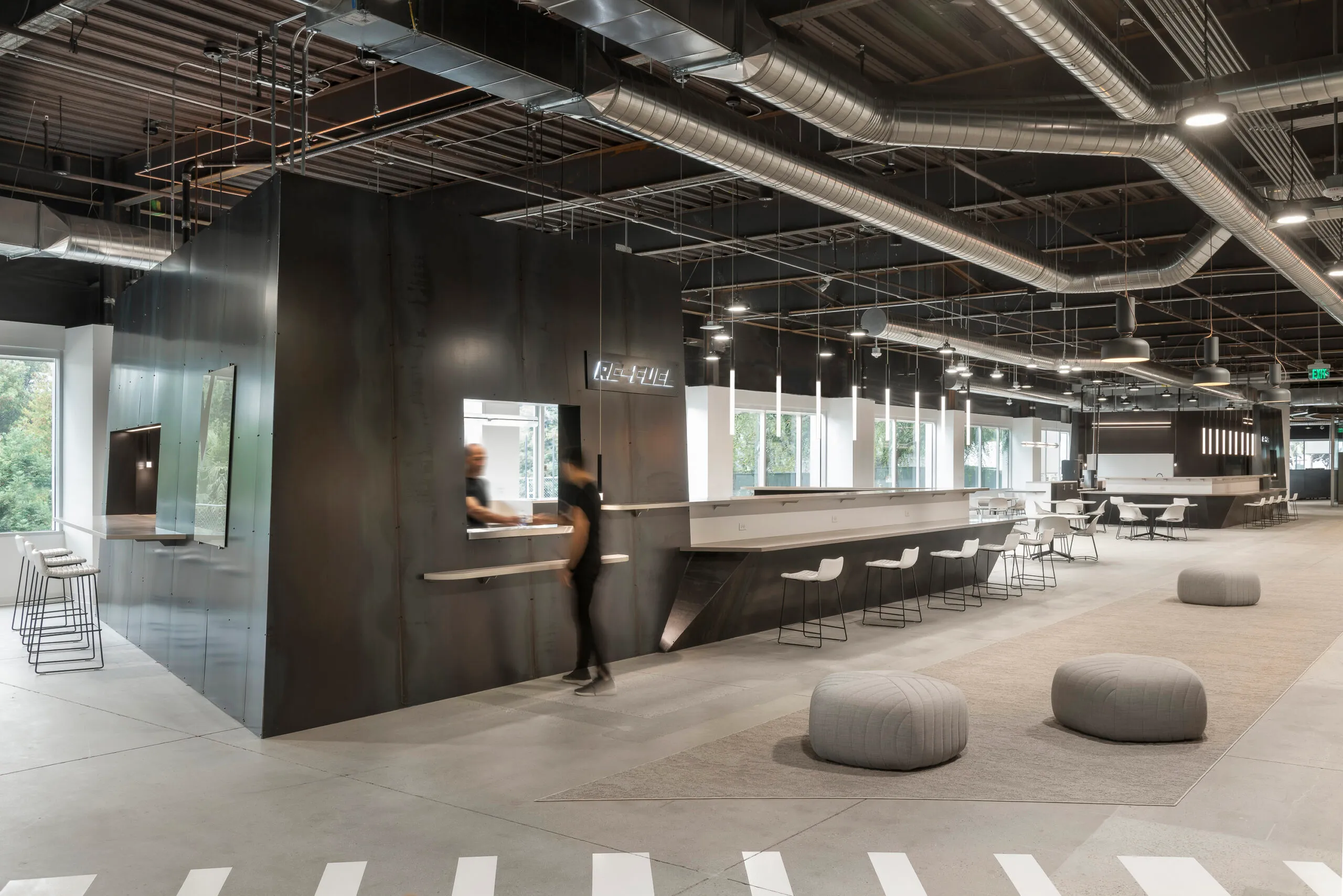 Lobby conference room with custom-built chassis frame mirroring the firm's concentration in the automotive sector